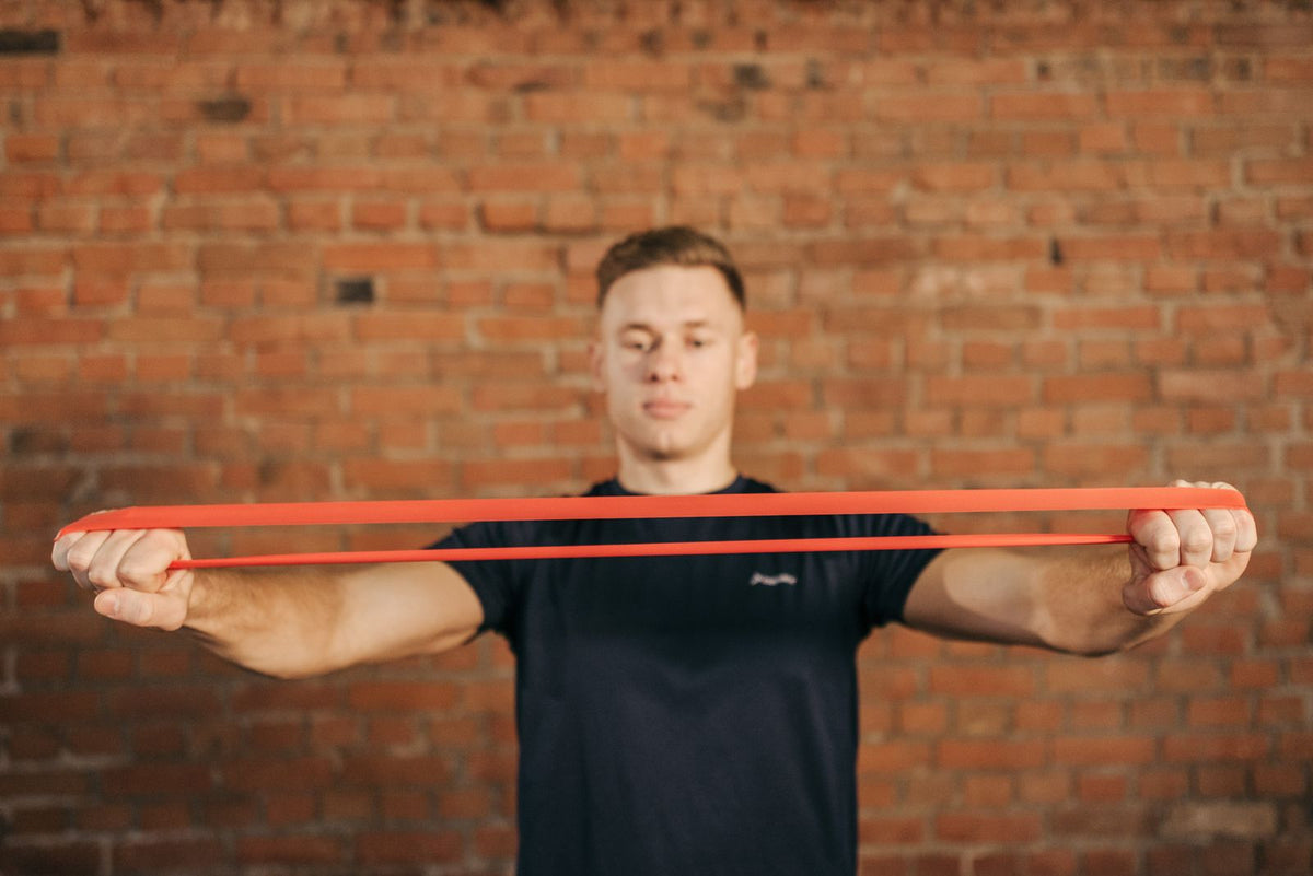 Man training with a resistance band