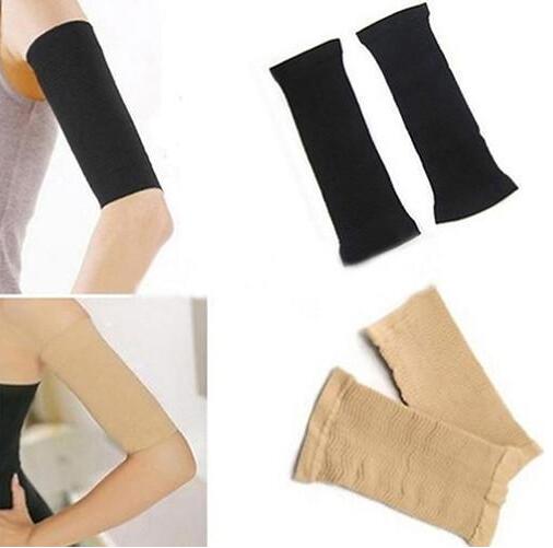 Pair of black compression arm sleeves worn for workouts